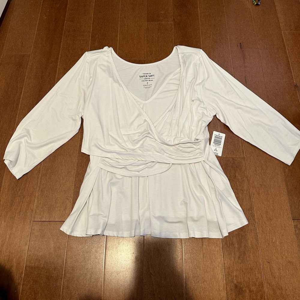 Torrid, peplum style top